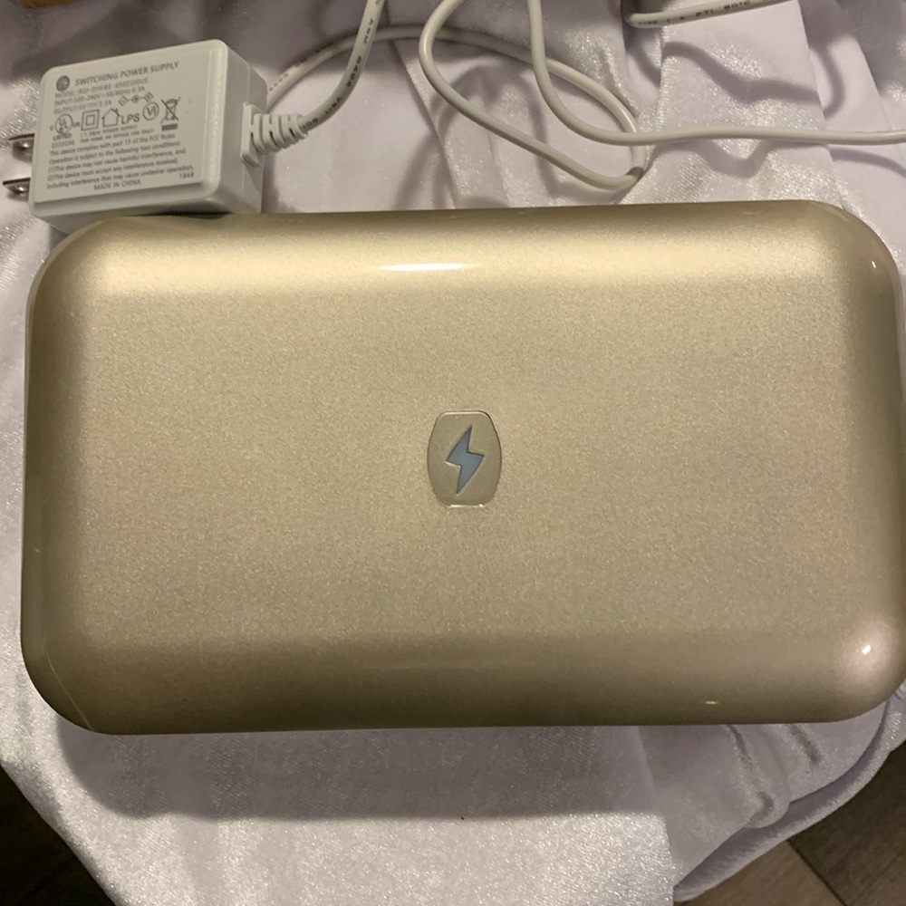 Phone Soap UV phone sanitizer .